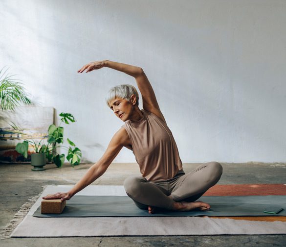 woman-doing-stretches-at-home